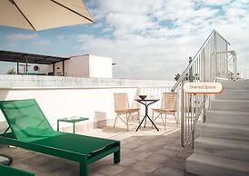 Los Olivos Apartments by Olala Homes