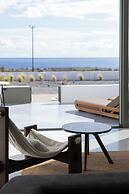 Acro Caldo Suites