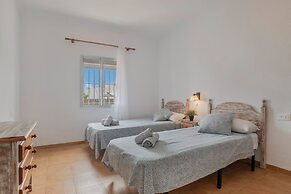 Apartamentos piscina compartida
