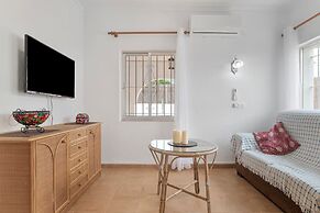 Apartamentos piscina compartida
