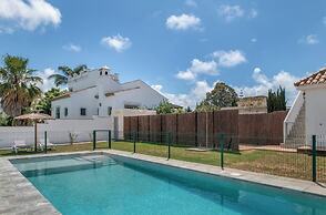 Apartamentos piscina compartida