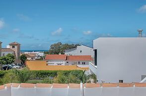 Apartamentos piscina compartida