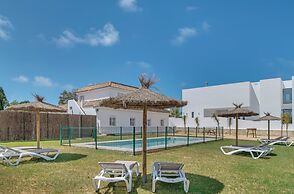 Apartamentos piscina compartida