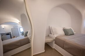 Three Domes Oia - an Iconic Collection