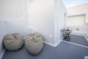 Three Domes Oia - an Iconic Collection