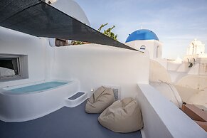 Three Domes Oia - an Iconic Collection