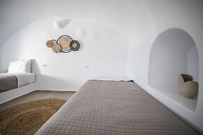 Three Domes Oia - an Iconic Collection