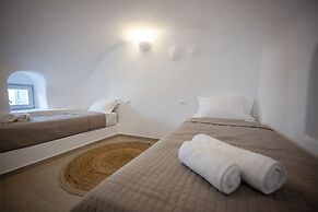 Three Domes Oia - an Iconic Collection