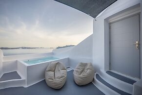 Three Domes Oia - an Iconic Collection