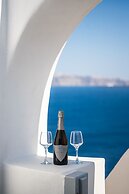 Three Domes Oia - an Iconic Collection