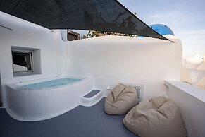 Three Domes Oia - an Iconic Collection
