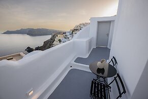 Three Domes Oia - an Iconic Collection