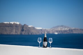 Three Domes Oia - an Iconic Collection