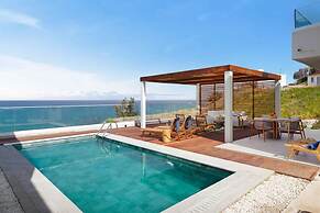 Villa Akroyiali Seafront Serenity Shared Pool