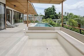 Tropical Poolside Retreat by Sea N' Rent