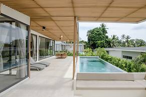 Tropical Poolside Retreat by Sea N' Rent