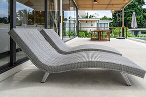 Tropical Poolside Retreat by Sea N' Rent
