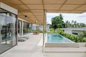 Tropical Poolside Retreat by Sea N' Rent
