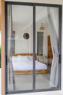 Tropical Poolside Retreat by Sea N' Rent