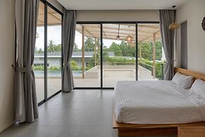 Tropical Poolside Retreat by Sea N' Rent