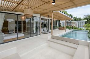 Tropical Poolside Retreat by Sea N' Rent