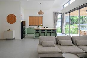 Tropical Poolside Retreat by Sea N' Rent