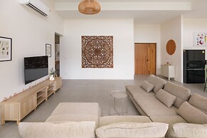 Tropical Poolside Retreat by Sea N' Rent