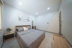 Songmee Pool Villa Nikompattana
