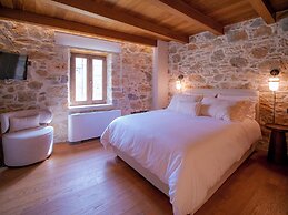 Santa Veneranda Suites by Checkin