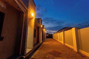 The Den Soroti White
