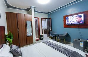 The Den Soroti White