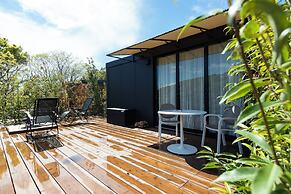 amarancia cottage hugging nature house