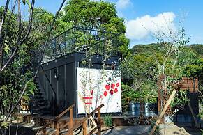 amarancia cottage hugging nature house
