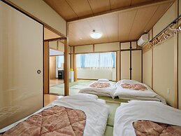 Okasan Hotel