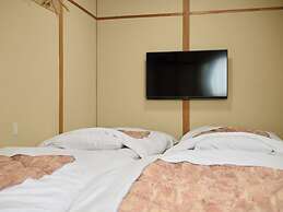 Okasan Hotel
