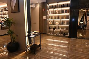 Aman Hotel ALmaali