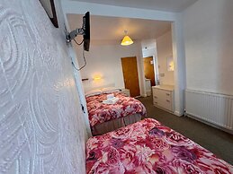 Pleasure Beach Hotel by OYO