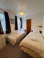 Pleasure Beach Hotel by OYO