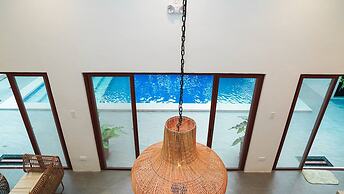Modern Tropical 2BR Villa & Pool Retreat in Amadeo