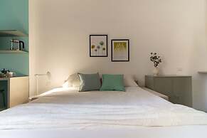 w Refined 1BR Steps From Milan s Cultural Core