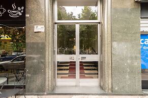 w Refined 1BR Steps From Milan s Cultural Core