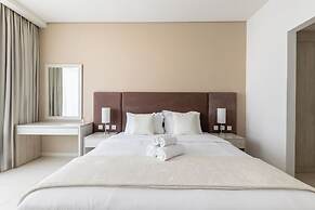 Stylish One-Bedroom Oasis Palm Location