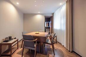 Yi Nian Fangcun Hotel