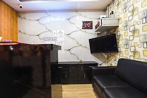 FabHotel Joy Residency