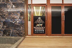 FabHotel Joy Residency