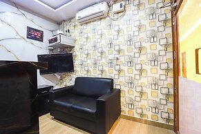 FabHotel Joy Residency