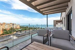 Beachfront Views and Poolside Stay