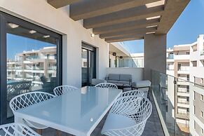 Beachfront Views and Poolside Stay