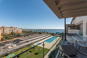 Beachfront Views and Poolside Stay