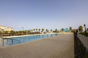 Beachfront Views and Poolside Stay